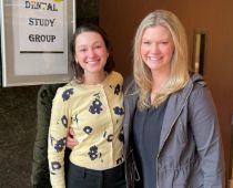 Two women smiling in the dental office